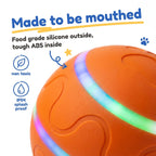 Close up of the BorkBall Disco food grade silicone shell with wavy grooves and glowing LED band