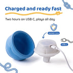 BorkBall Tug USB C rechargeable dog ball opened to show its sealed core charging in two hours