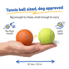BorkBall Zoom 67mm dog ball held next to a tennis ball showing the exact same size
